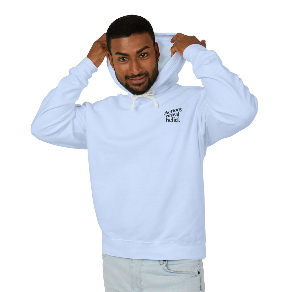 Man wearing a light blue hoodie with text on a white background