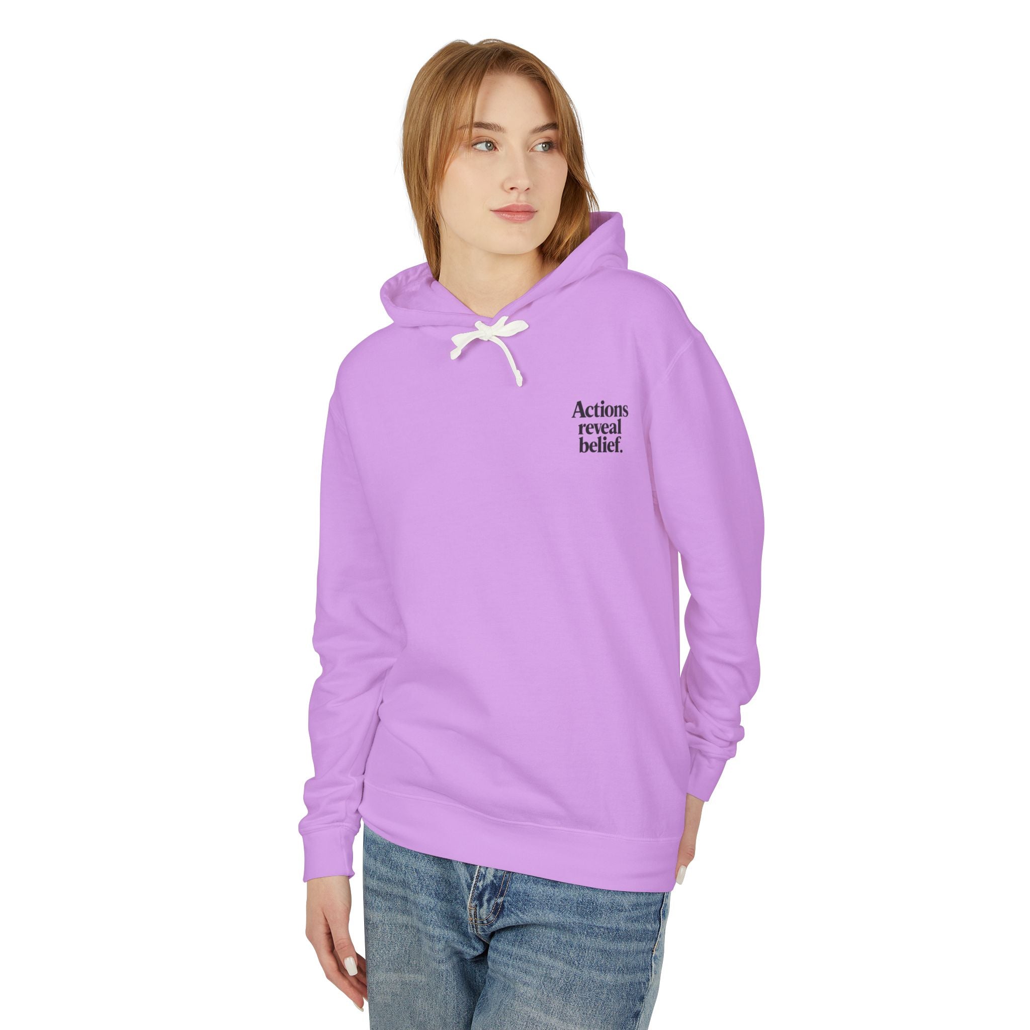 Person wearing a purple hoodie with text on a white background