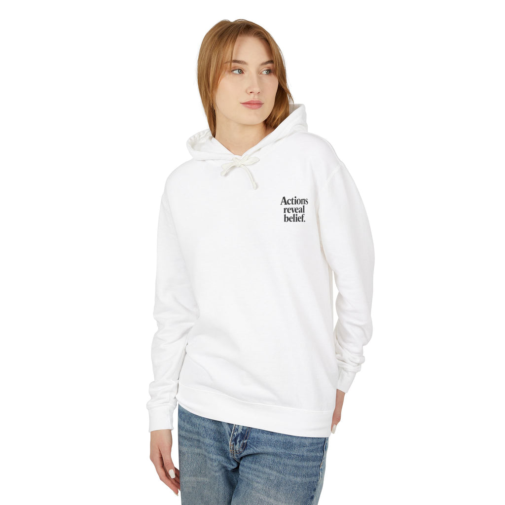 Person wearing a white hoodie with text on a white background