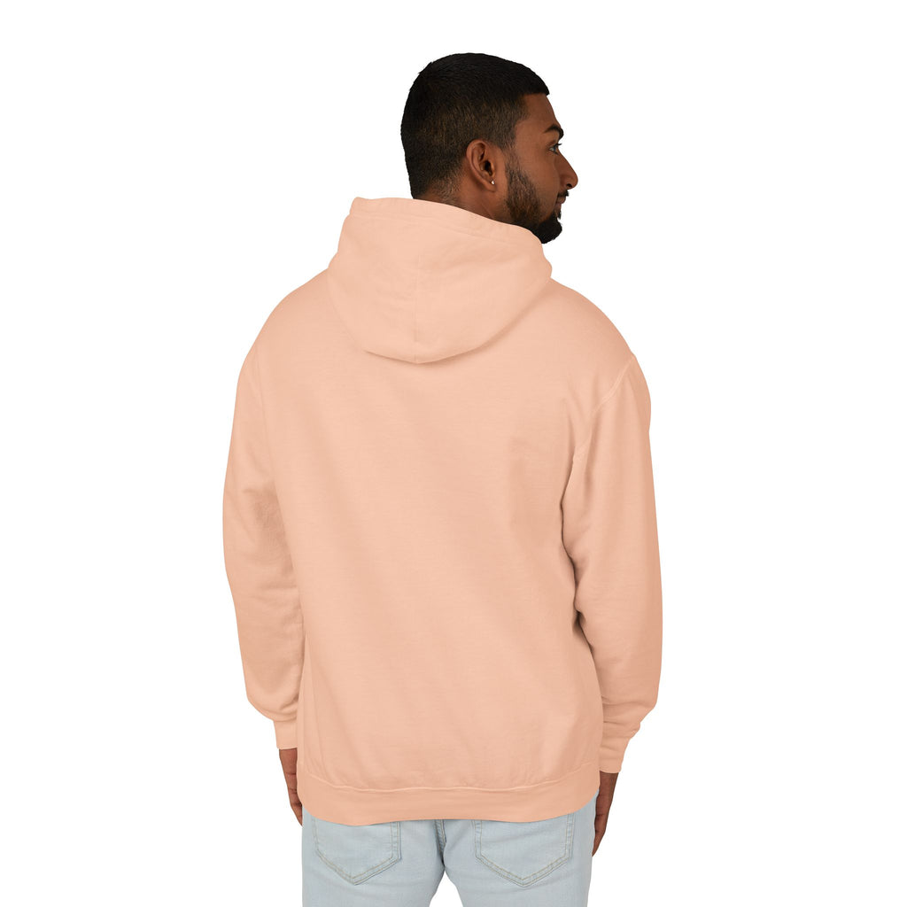Man wearing a peach hoodie on a white background