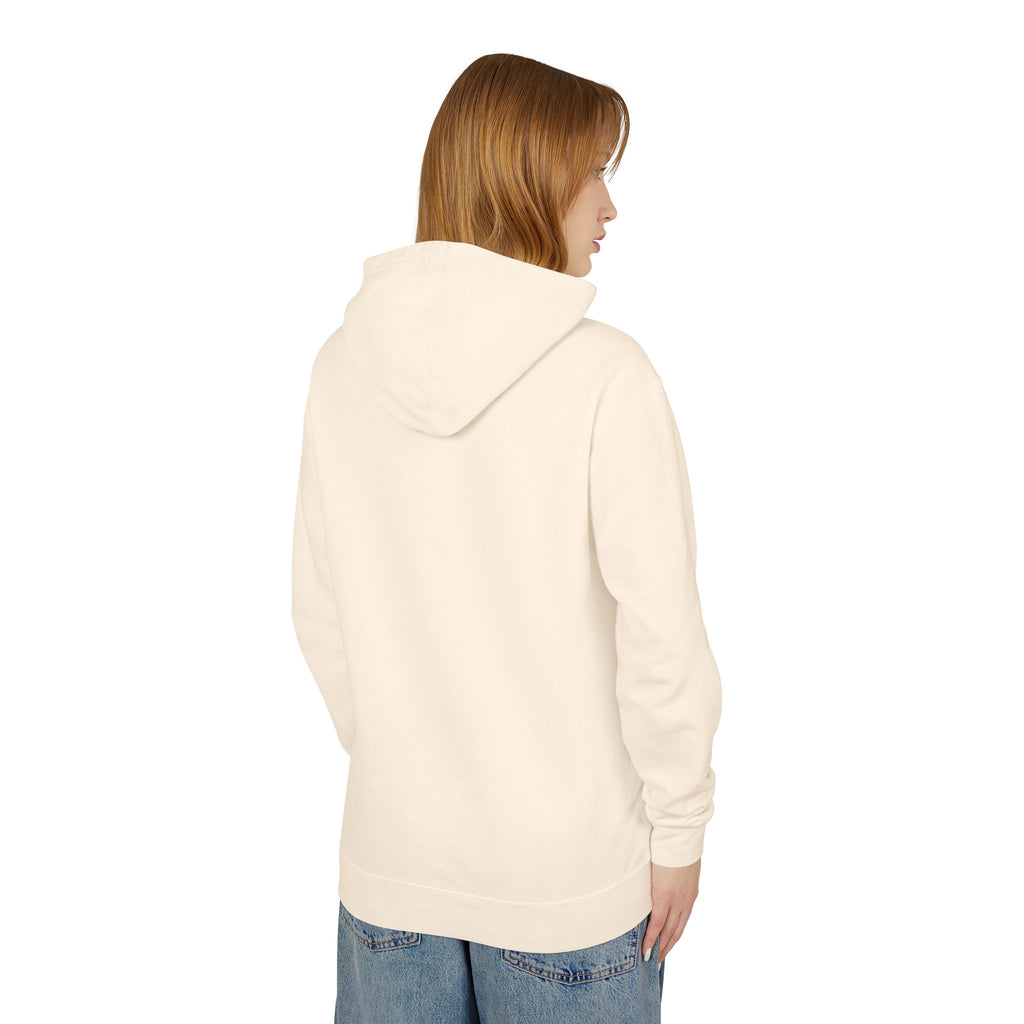 Person wearing a cream hoodie on a white background