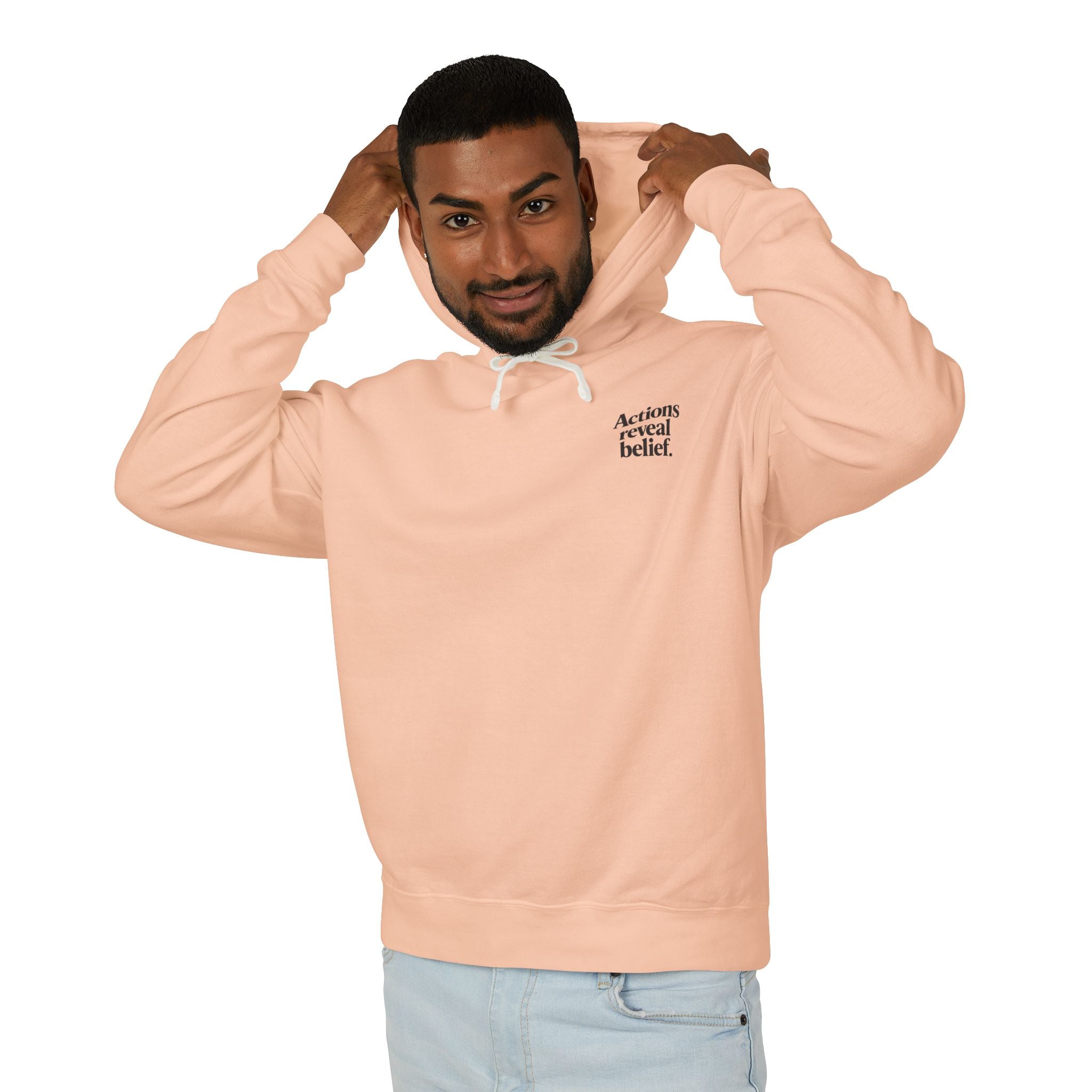 Man wearing a peach hoodie with text on a white background