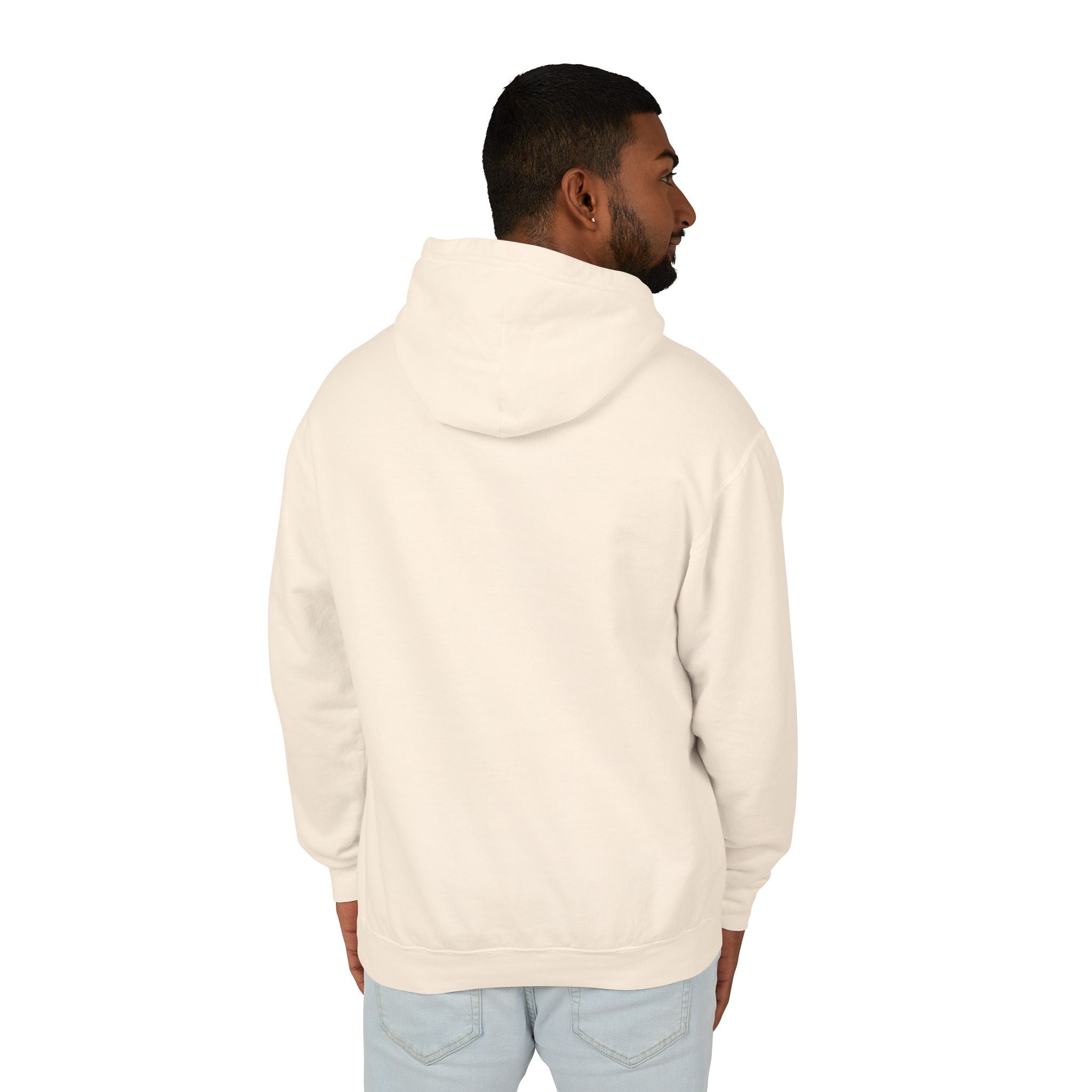 Man wearing a beige hoodie with text on the back, standing against a white background