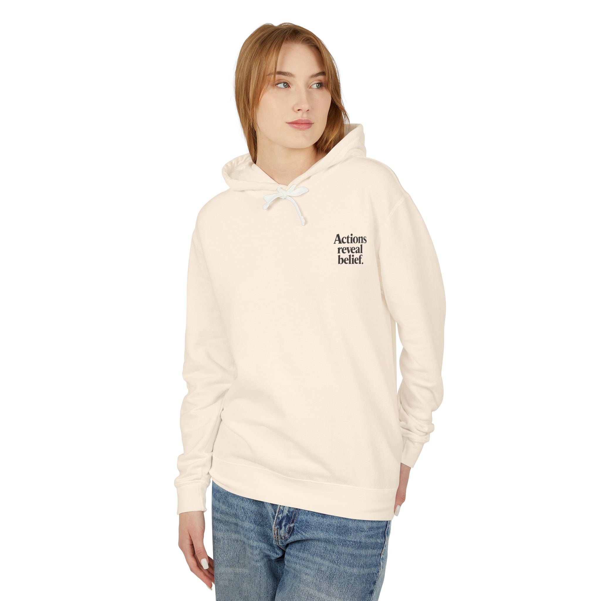 Woman wearing a cream hoodie with text on a white background